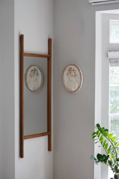 istock Vintage Mirror On Wall With Decorative Oval Frame Piece. 2174535894