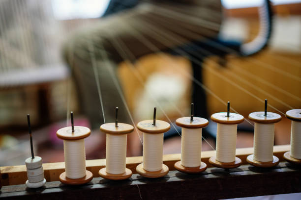Spools of thread at a textile factory that weaves kimono fabric out of silk