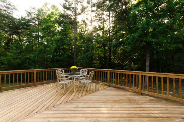 istock Outdoor Patio With Table And Chairs Amidst Greenery 2174545319