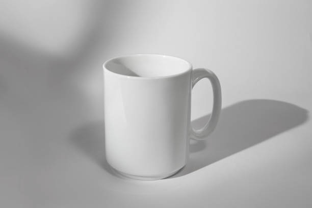 istock White coffee mug isolated on white background with shadow 2174547230