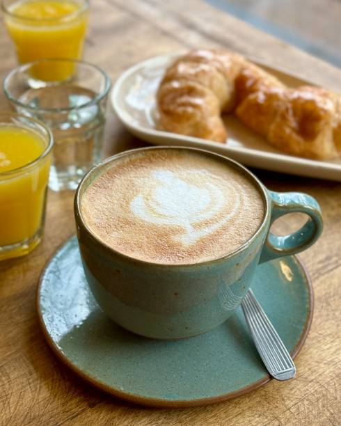 istock Breakfast or brunch table scene on a wooden background. Above view. 2174554697
