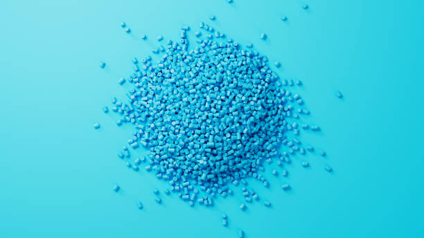 istock Closeup top view on cyan plastic polypropylene granules heap centered on turquoise backdrop, masterbatch polymer grain pile. HDPE or PVC resin pellets. 3d render illustration 2174570666