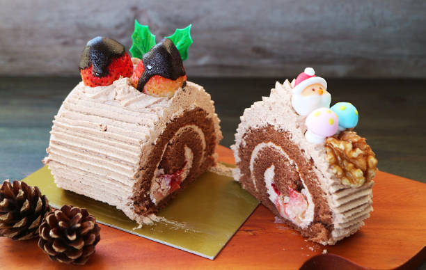 Mouthwatering Christmas Yule Log Cake with Fresh Strawberries and Walnut