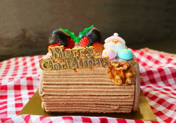 Delectable Christmas Buche de Noel with Fresh Strawberries and Walnut