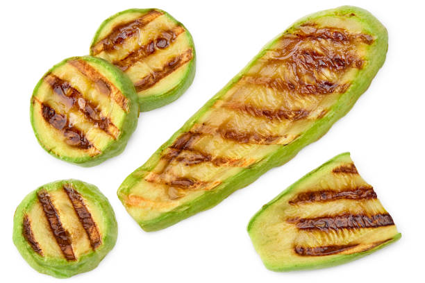 istock grilled sliced zucchini isolated on white background. clipping path 2174574778