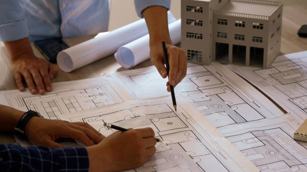Engineer teams meeting working together. Foreman industry project manager engineer teamwork. Asian industry professional team.