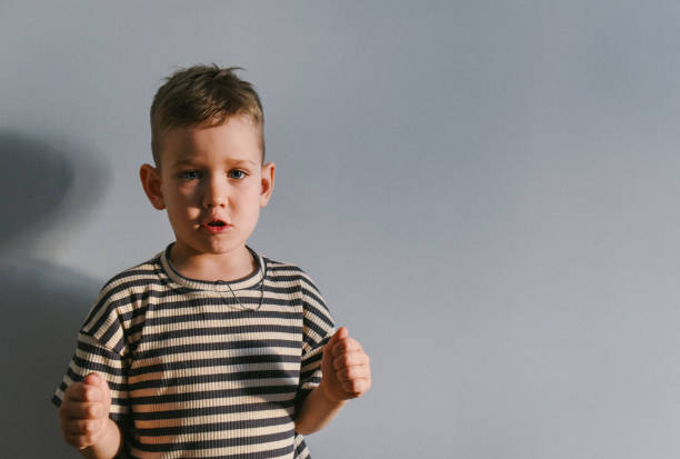 istock A boy near the wall 2174579930