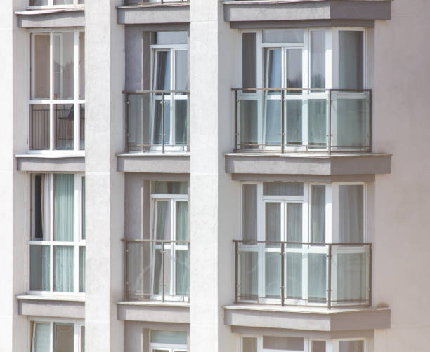istock A tall building with many windows and balconies 2174580468