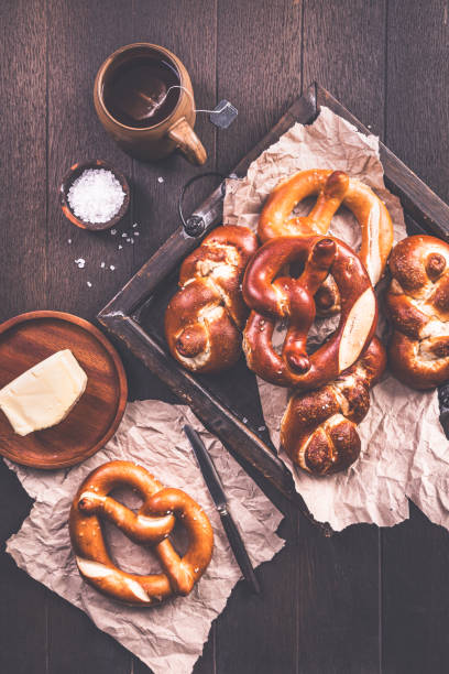 istock German pretzels on kitchen table with salt and butter 2174580477