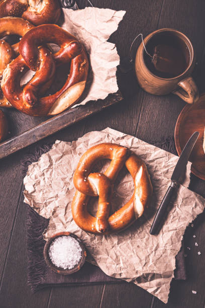 istock German pretzels on kitchen table with salt and butter 2174580501