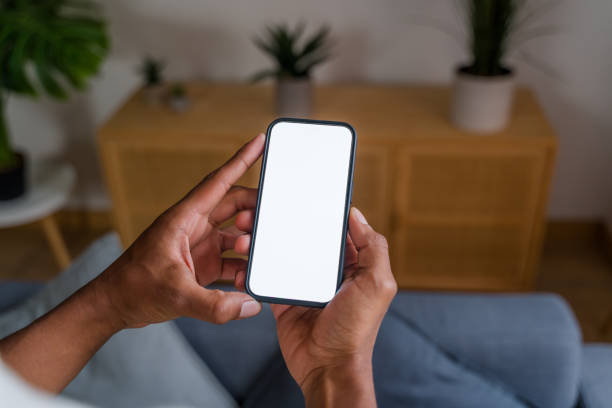 istock Person holding smartphone with blank white screen 2174581758