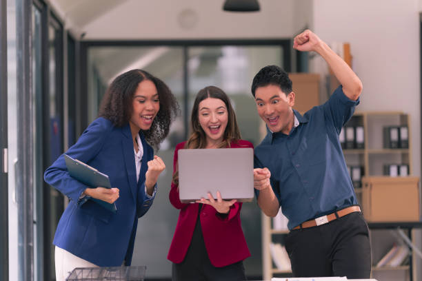 istock Business team shaking hands celebrating success Applause and shaking hands celebrating success in business deal Business people presenting their business start-up project together 2174581807