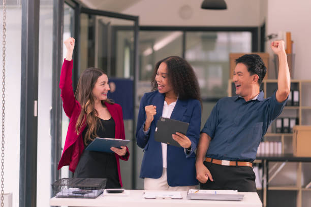 istock Business team shaking hands celebrating success Applause and shaking hands celebrating success in business deal Business people presenting their business start-up project together 2174581840
