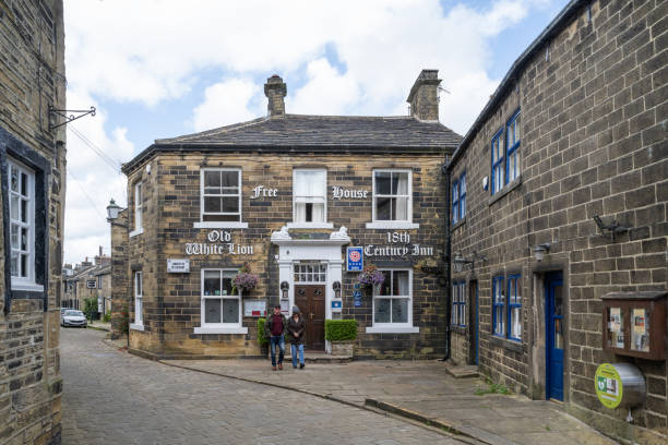 09.08.2024 Haworth, UK. A historic 18th-century inn in Haworth, West Yorkshire, the Old White Lion stands as a charming Free House, offering visitors a taste of traditional hospitality in the heart of this famous literary village.