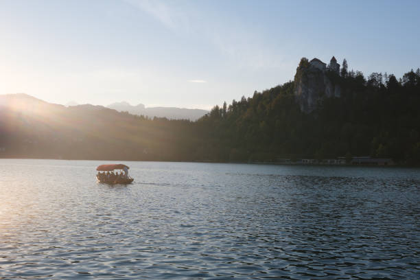istock beautiful lake with castle on cliff 2174594186