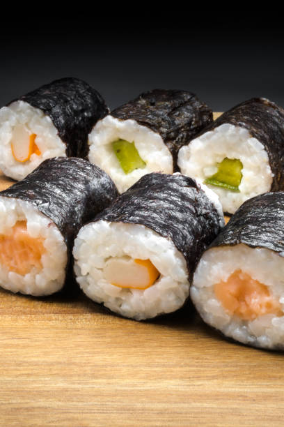 istock Sushi, a Japanese dish made of cooked rice 2174595074