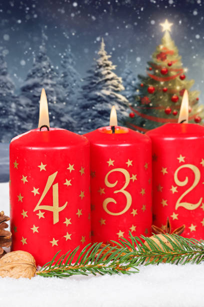 istock Fourth 4th Sunday in advent with burning candle Christmas tree time portrait format with copyspace copy space 2174606816