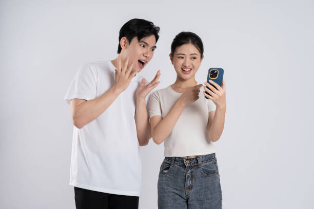 istock Image of Asian couple posing on white background 2174617252