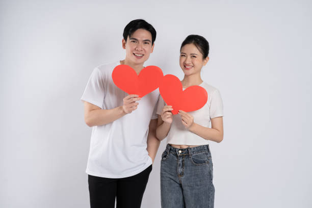 istock Image of Asian couple posing on white background 2174617362