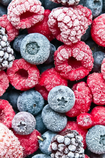 istock Close up image of fresh frozen blackberries, blueberries and raspberry. 2174620082