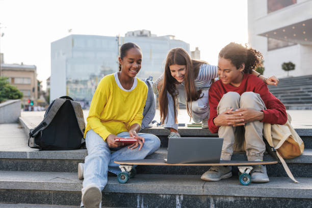 istock Teenagers enjoying outdoor study session on city steps 2174624228