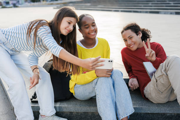 istock Diverse friends taking a selfie outdoors 2174624409