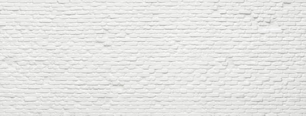 istock brick wall made of clinker stone painted white as background 2174625477