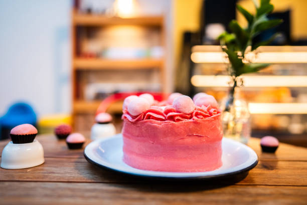 Birthday Cake with a modern pink color and one candle on top. Minimal 3D rendering concept