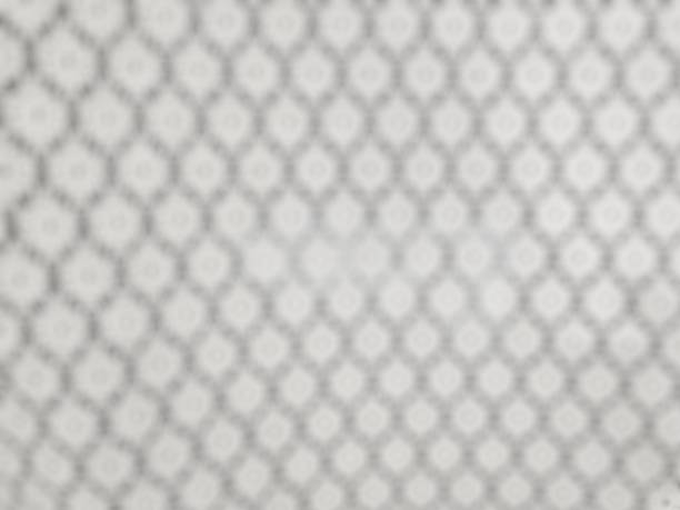 istock Blurred seamless monotone pattern. Black dots on white background. Abstract black and white background for design as banner, ads, and presentation concept 2174643605