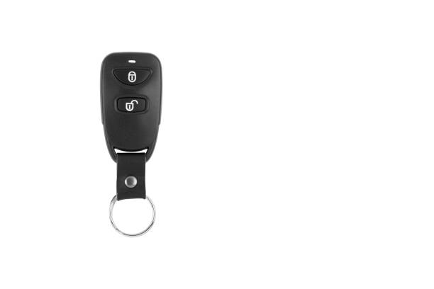 A high-quality image of a black car key fob isolated on a white background. Ideal for showcasing automotive keyless entry systems, security devices, and car remote controls.