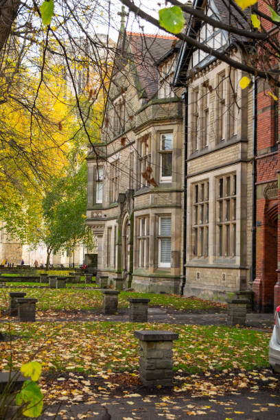 istock Front of Victorian style British houses with garden 2174647347