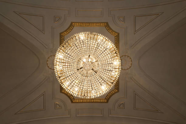 istock Low angle view of a crystal lamp hanging from the ceiling 2174649211