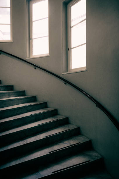 Black stairs inside modern building.