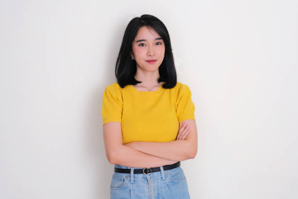 istock Young women smiling confident with arms crossed 2174654623