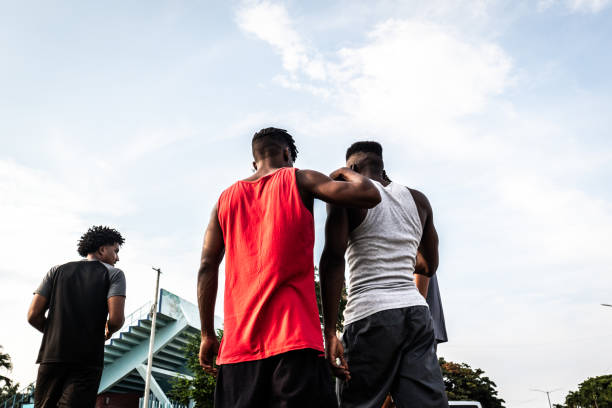 istock Young athletes men talking outdoors 2174656475