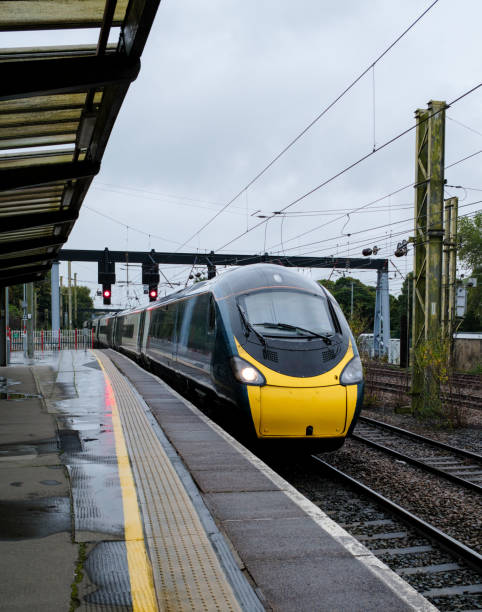 istock Modern Inter-City Train Arriving at Station 2174656606
