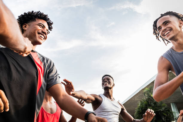 istock Young athletes men talking outdoors 2174657965