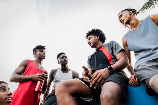 istock Young athlete men talking outdoors 2174659315