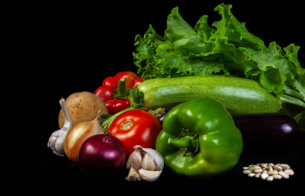 istock Fresh organic vegetables on a black background 2174661460