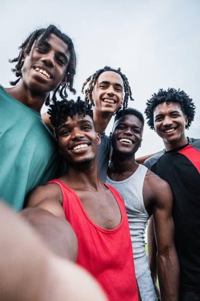 istock Young athlete friends taking a selfie outdoors - Camera point of view 2174662578