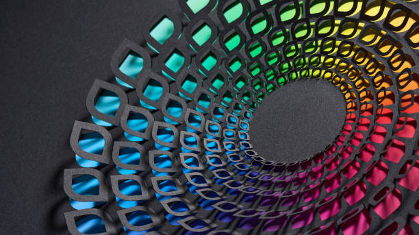 istock Intricate circular paper artwork with colorful layers forming a spiral pattern against a dark background. 2174663689