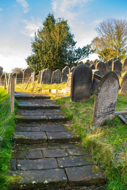 istock Stone steps next to ancient gravestones in Yorkshire England 2174665294
