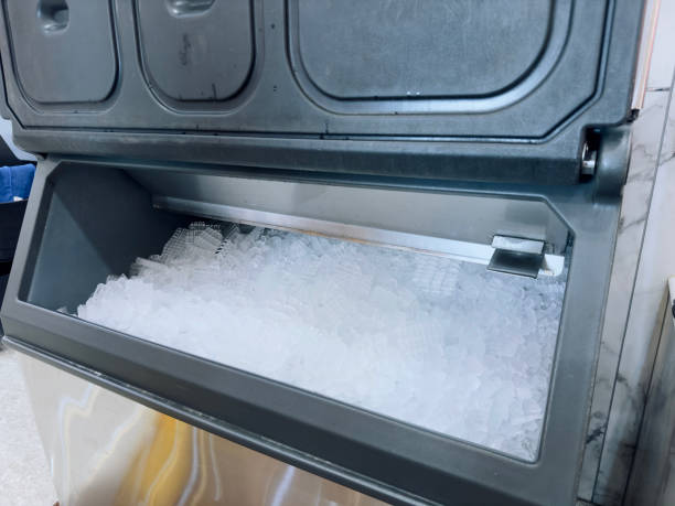 istock Ice cubes store in ice making machine for clean product. Ice cube maker. Cube ice machine. Suitable for small beverage shops. 2174668736