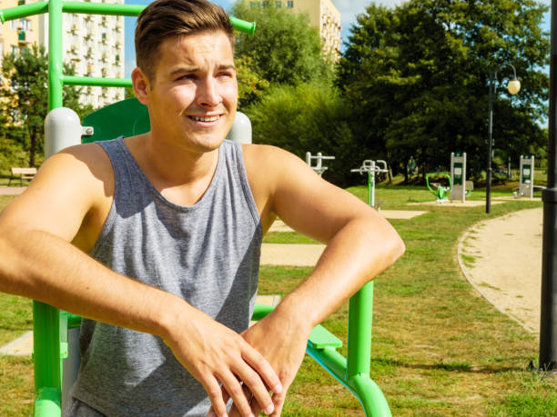 istock Young man relaxing after outdoor workout 2174670666