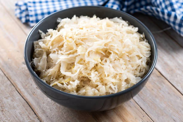 istock Sauerkraut in a bowl on wooden table 2174670931