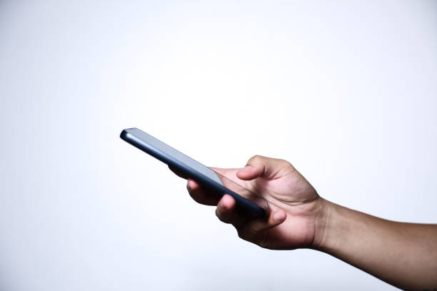 istock Hand holding smartphone on white background. QR code payment concept. Digital money payment. 2174677814