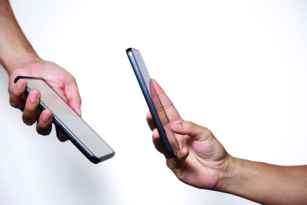 istock Hand holding smartphone on white background. QR code payment concept. Digital money payment. 2174678420