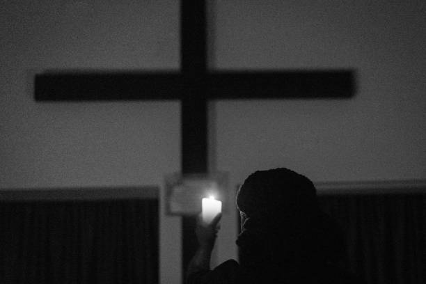 istock Candlelight Worship by the Cross 2174681343