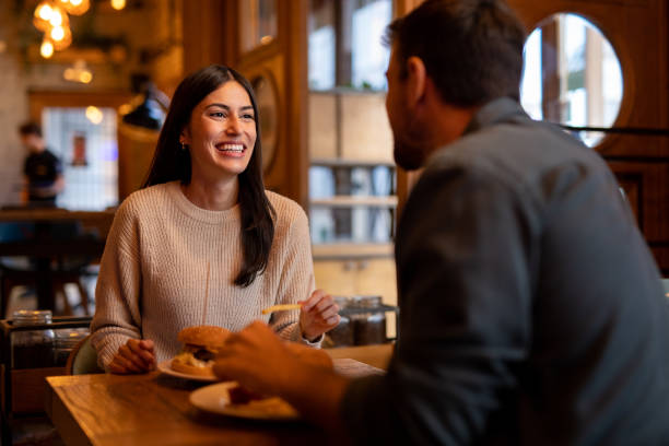 istock Happy couple eating in the restaurant 2174685915