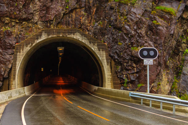 istock tunnel on the norwegian mountain road 2174692524